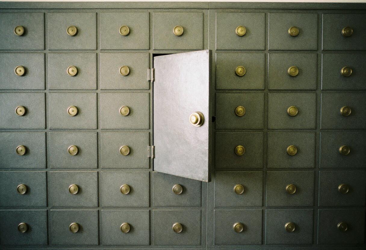 Safe deposit boxes: the older answer to holding value outside a bank's ledger.